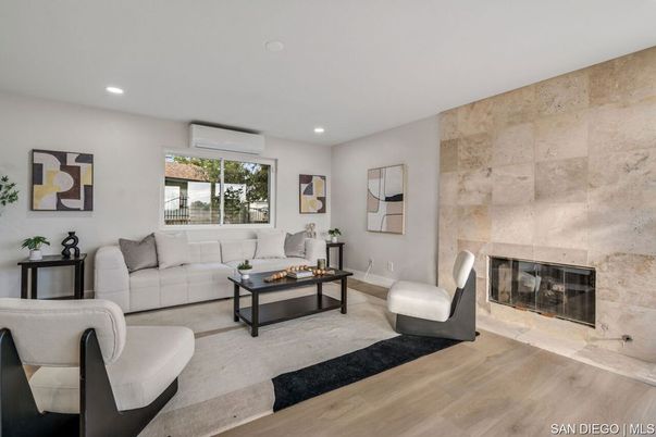 Fireplace, Interior, Living room, Recessed Lighting, Stone Walls, Wood Texture Flooring