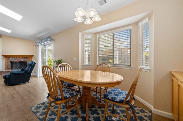 Chandelier, Dining room, Fireplace, Interior, Living room, Wood Texture Flooring