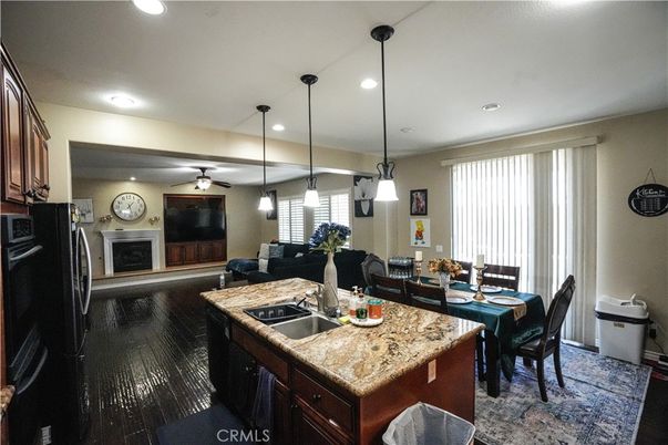 Dining room, Fireplace, Interior, Kitchen, Living room, Pendant Lights, Recessed Lighting, Wood Texture Flooring