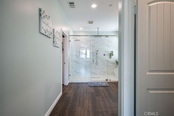 Bathroom, Glass Shower, Interior, Marble Walls, Recessed Lighting, Wood Texture Flooring