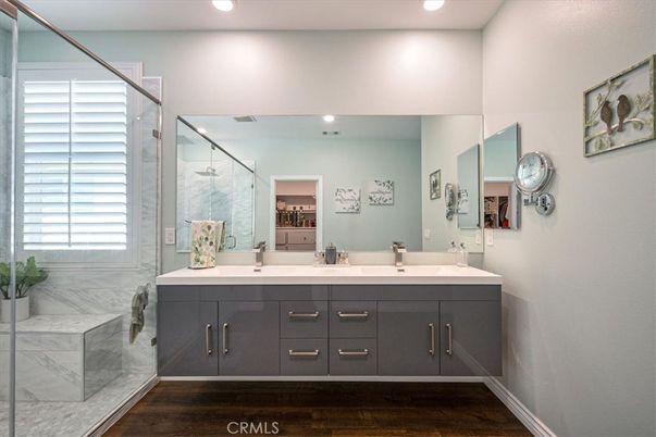 Bathroom, Dual Sink Vanities, Glass Shower, Interior, Recessed Lighting, Wood Texture Flooring