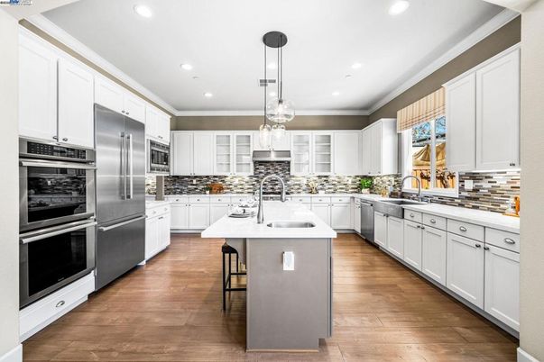 Interior, Kitchen, Pendant Lights, Recessed Lighting, Stainless Steel Appliances, Wood Texture Flooring