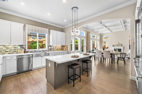 Dining room, Interior, Kitchen, Pendant Lights, Recessed Lighting, Stainless Steel Appliances, Wood Texture Flooring