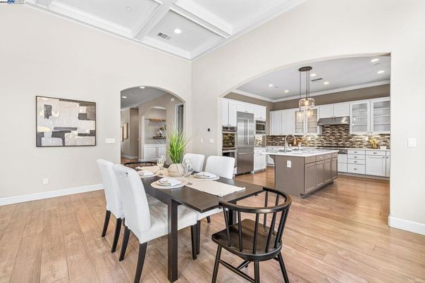 Dining room, Interior, Kitchen, Pendant Lights, Recessed Lighting, Stainless Steel Appliances, Wood Texture Flooring