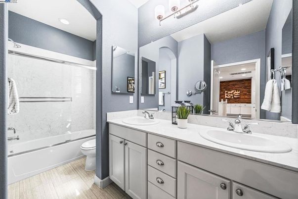Bathroom, Dual Sink Vanities, Interior, Recessed Lighting, Wood Texture Flooring