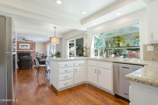 Fireplace, Interior, Kitchen, Pendant Lights, Recessed Lighting, Stone Walls, Wood Texture Flooring
