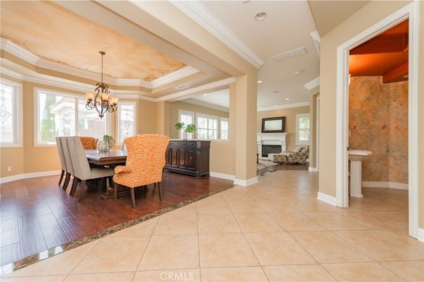 Chandelier, Dining room, Fireplace, Interior, Recessed Lighting, Wood Texture Flooring