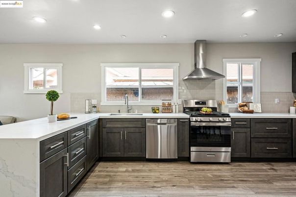 Interior, Kitchen, Recessed Lighting, Stainless Steel Appliances, Wood Texture Flooring