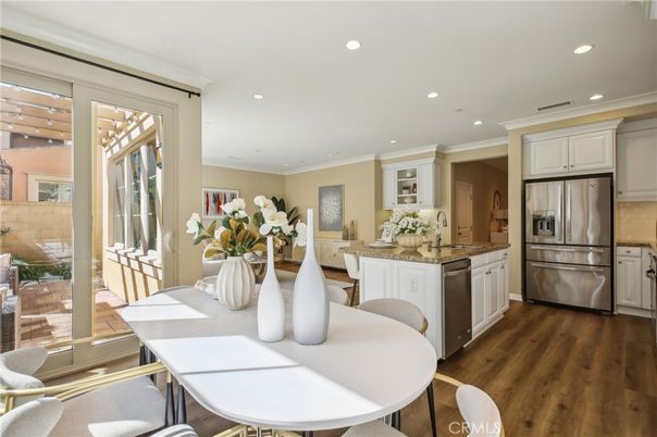 Dining room, Interior, Kitchen, Recessed Lighting, Stainless Steel Appliances, Wood Texture Flooring