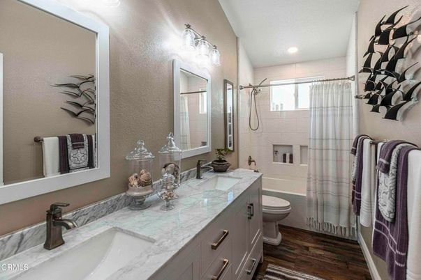 Bathroom, Dual Sink Vanities, Glass Shower, Interior, Recessed Lighting, Wood Texture Flooring