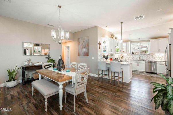 Dining room, Interior, Kitchen, Pendant Lights, Recessed Lighting, Stainless Steel Appliances, Wood Texture Flooring