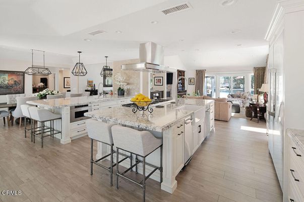 Dining room, Interior, Kitchen, Living room, Pendant Lights, Recessed Lighting, Stainless Steel Appliances, Wood Texture Flooring