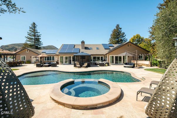 Exterior, Pool, Solar Panels