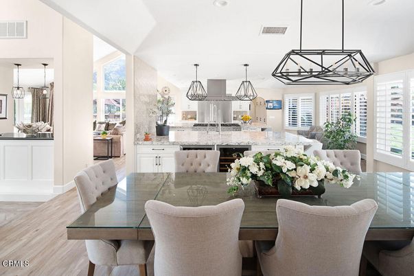 Dining room, Interior, Kitchen, Pendant Lights, Recessed Lighting, Stainless Steel Appliances, Wood Texture Flooring