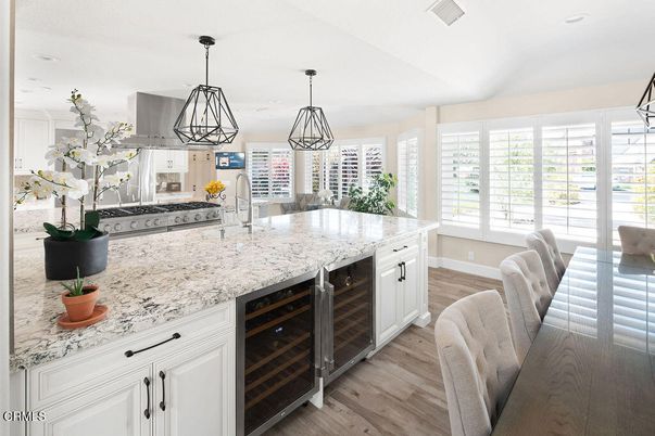 Dining room, Interior, Kitchen, Pendant Lights, Recessed Lighting, Stainless Steel Appliances, Wood Texture Flooring