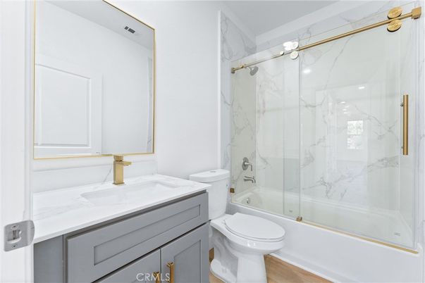 Bathroom, Glass Shower, Interior, Marble Walls, Wood Texture Flooring