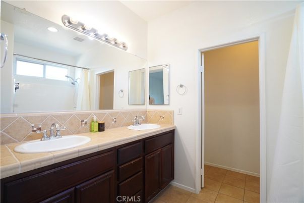 Bathroom, Dual Sink Vanities, Interior, Recessed Lighting, Tile Countertops