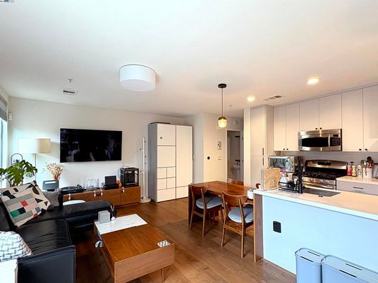 Dining room, Interior, Kitchen, Living room, Pendant Lights, Recessed Lighting, Stainless Steel Appliances, Wood Texture Flooring