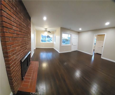 Empty room, Fireplace, Interior, Recessed Lighting, Stone Walls, Wood Texture Flooring