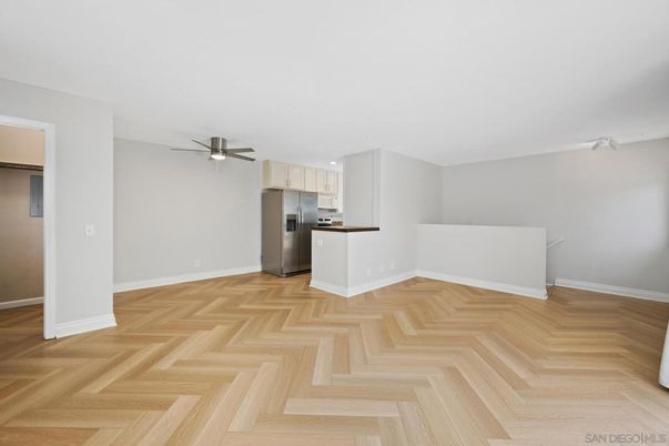 Empty room, Interior, Kitchen, Stainless Steel Appliances, Wood Texture Flooring