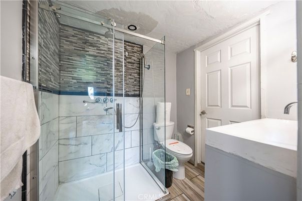 Bathroom, Glass Shower, Interior, Wood Texture Flooring