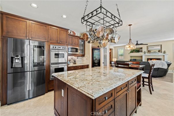Dining room, Fireplace, Interior, Kitchen, Living room, Pendant Lights, Recessed Lighting, Stainless Steel Appliances