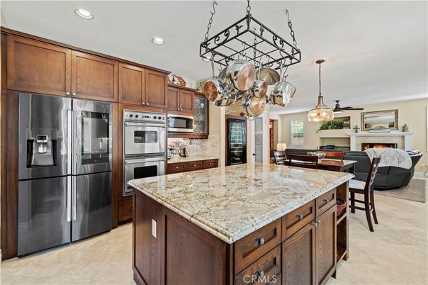 Fireplace, Interior, Kitchen, Living room, Pendant Lights, Recessed Lighting, Stainless Steel Appliances