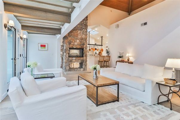 Fireplace, Interior, Living room, Pendant Lights, Recessed Lighting, Stone Walls, Wooden Beams