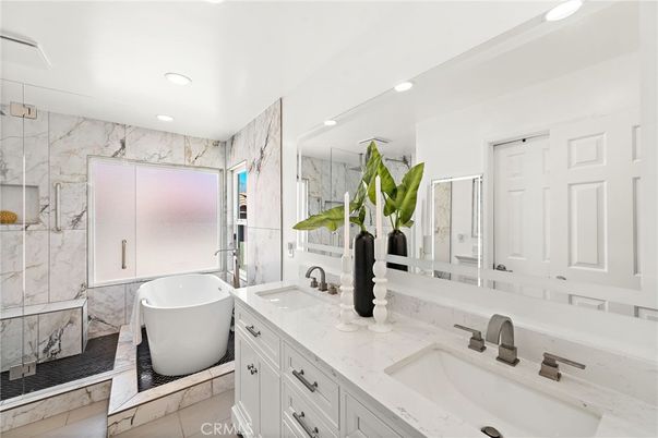 Bathroom, Dual Sink Vanities, Free Standing Baths, Glass Shower, Interior, Marble, Marble Walls, Recessed Lighting