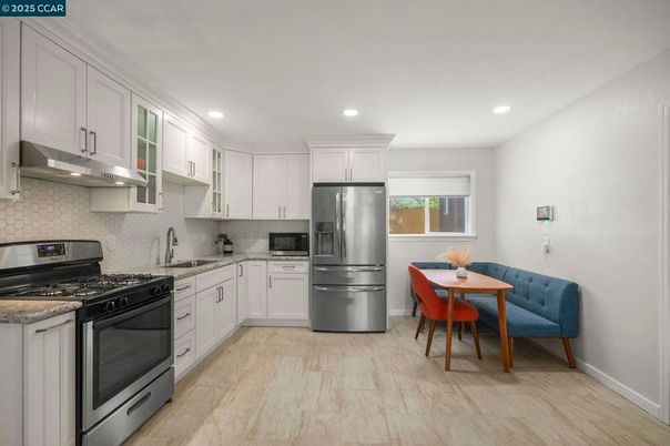 Dining room, Interior, Kitchen, Recessed Lighting, Stainless Steel Appliances, Wood Texture Flooring
