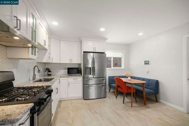Dining room, Interior, Kitchen, Recessed Lighting, Stainless Steel Appliances, Wood Texture Flooring