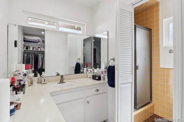 Bathroom, Dual Sink Vanities, Interior, Recessed Lighting, Walk-in Closets