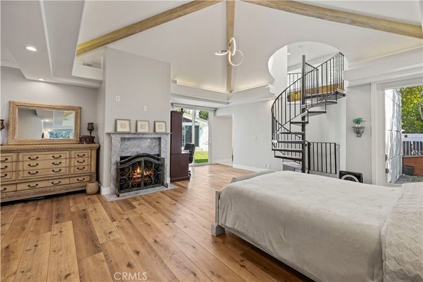 Bedroom, Fireplace, Interior, Pendant Lights, Recessed Lighting, Wood Texture Flooring