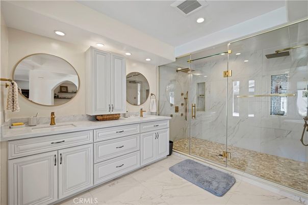 Bathroom, Dual Sink Vanities, Glass Shower, Interior, Marble, Marble Walls, Recessed Lighting