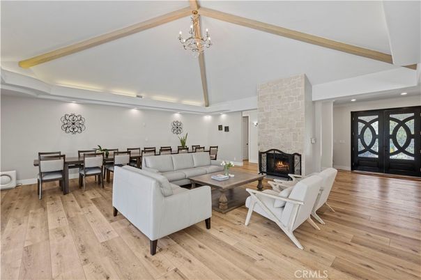 Chandelier, Dining room, Fireplace, Interior, Living room, Recessed Lighting, Wooden Beams, Wood Texture Flooring