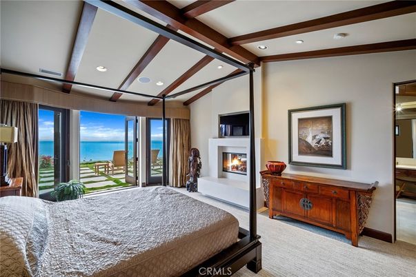 Bedroom, Fireplace, Interior, Recessed Lighting, Water, Wooden Beams