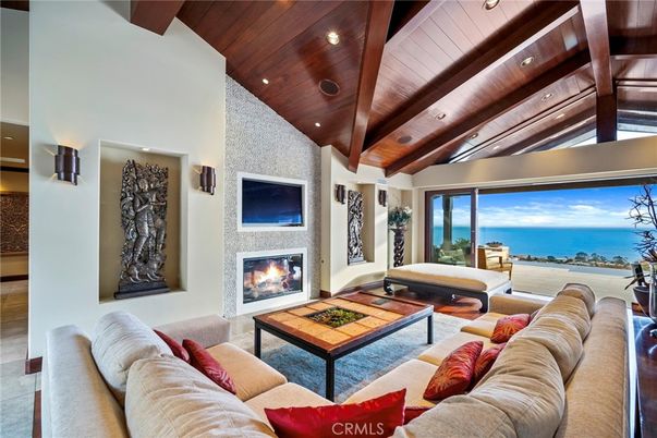 Fireplace, Interior, Living room, Recessed Lighting, Stone Walls, Water, Wooden Beams, Wooden Ceilings
