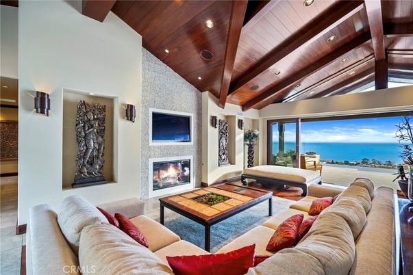 Fireplace, Interior, Living room, Recessed Lighting, Stone Walls, Water, Wooden Beams, Wooden Ceilings