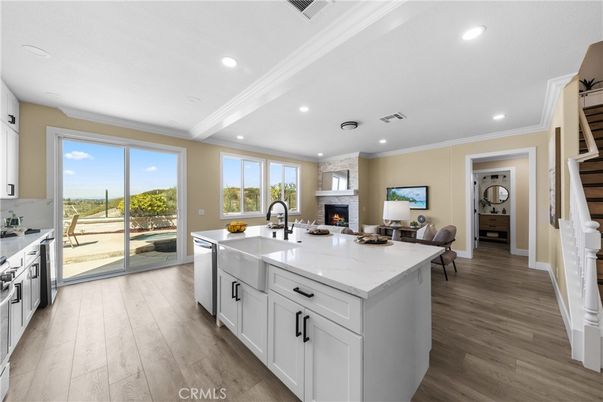 Fireplace, Interior, Kitchen, Recessed Lighting, Wood Texture Flooring
