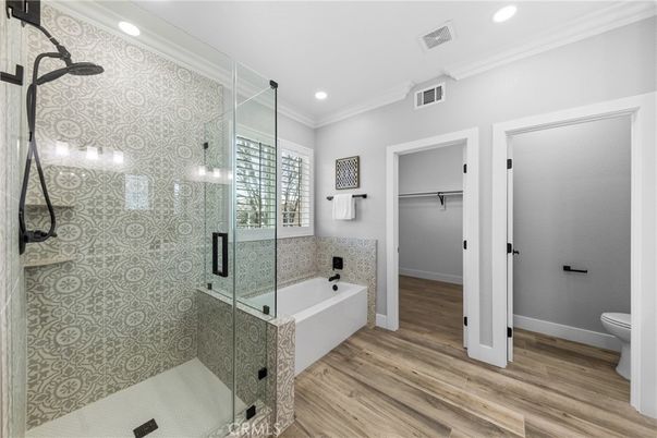Bathroom, Glass Shower, Interior, Pendant Lights, Recessed Lighting, Wood Texture Flooring