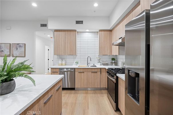 Interior, Kitchen, Recessed Lighting, Stainless Steel Appliances, Wood Texture Flooring