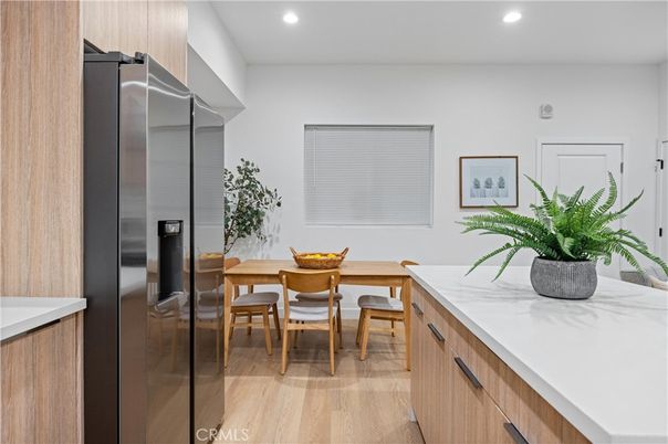 Dining room, Interior, Kitchen, Recessed Lighting, Stainless Steel Appliances, Wood Texture Flooring