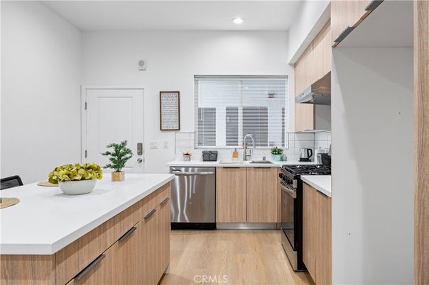Interior, Kitchen, Recessed Lighting, Stainless Steel Appliances, Wood Texture Flooring