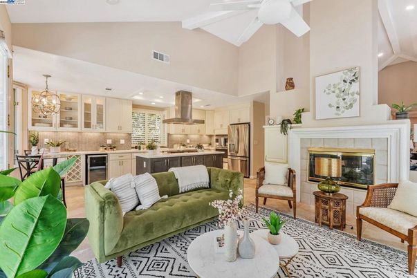 Chandelier, Fireplace, Interior, Kitchen, Living room, Pendant Lights, Recessed Lighting, Stainless Steel Appliances