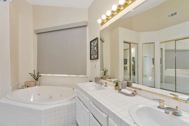 Bathroom, Dual Sink Vanities, Glass Shower, Interior, Tile Countertops