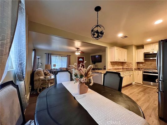 Dining room, Interior, Kitchen, Living room, Pendant Lights, Recessed Lighting, Stainless Steel Appliances, Wood Texture Flooring