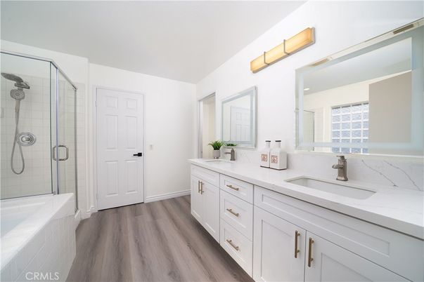 Bathroom, Dual Sink Vanities, Glass Shower, Interior, Wood Texture Flooring