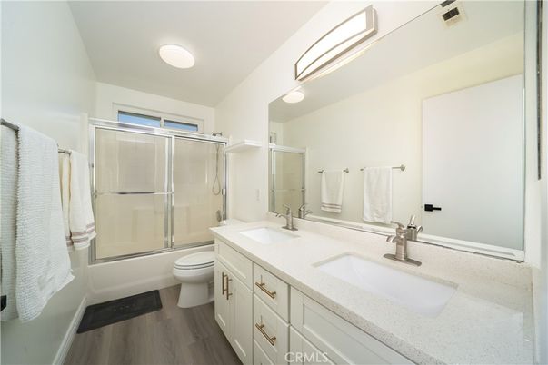 Bathroom, Dual Sink Vanities, Glass Shower, Interior, Wood Texture Flooring