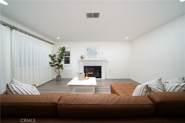 Fireplace, Interior, Living room, Recessed Lighting, Wood Texture Flooring