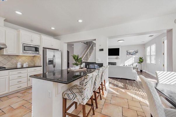 Fireplace, Interior, Kitchen, Living room, Recessed Lighting, Stainless Steel Appliances